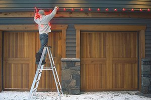 Putting up Christmas Lights Total Therapy Physiotherapy Massage Therapy